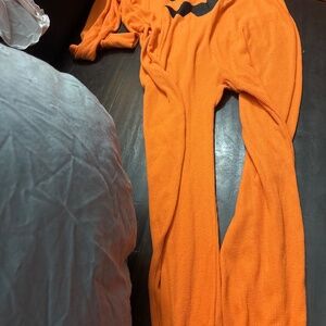 Orange pumpkin onesie pajamas